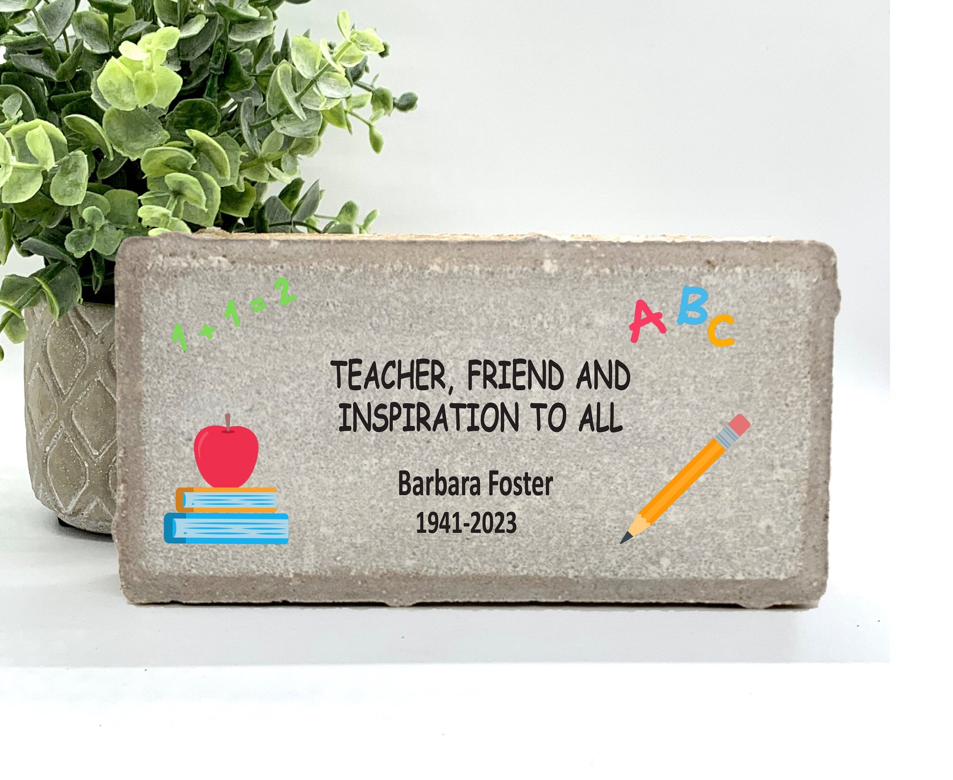 Personalized Teacher Memorial Gift with a variety of indoor and outdoor stone choices at www.florida-funshine.com. Our Personalized Family And Friends Memorial Stones serve as heartfelt sympathy gifts for those grieving the loss of a loved one, ensuring a lasting tribute cherished for years. Enjoy free personalization, quick shipping in 1-2 business days, and quality crafted memorials made in the USA.