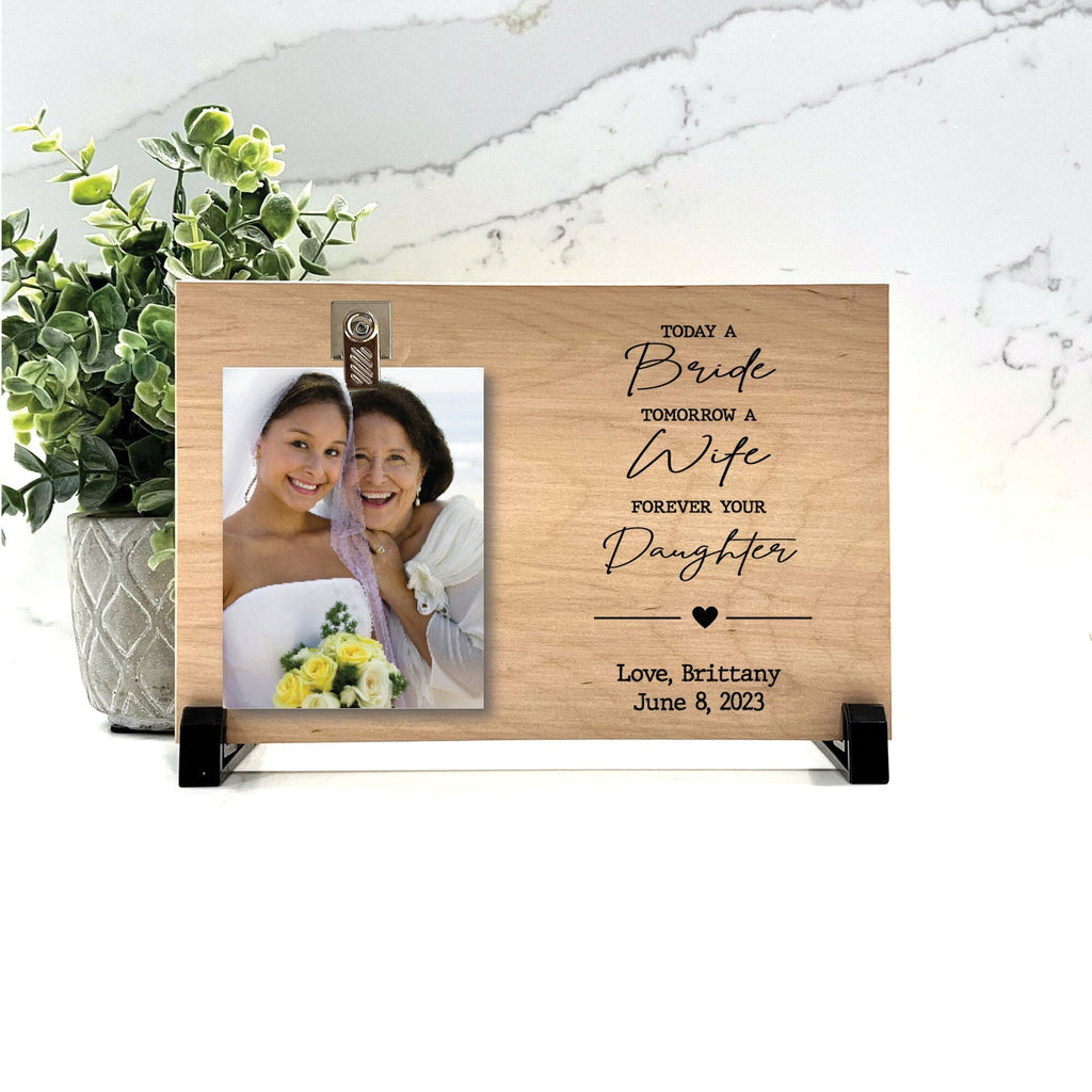 Customize your cherished moments with our Mother of the Bride Personalized Picture Frame available at www.florida-funshine.com. Create a heartfelt gift for family and friends with free personalization, quick shipping in 1-2 business days, and quality crafted picture frames, portraits, and plaques made in the USA.