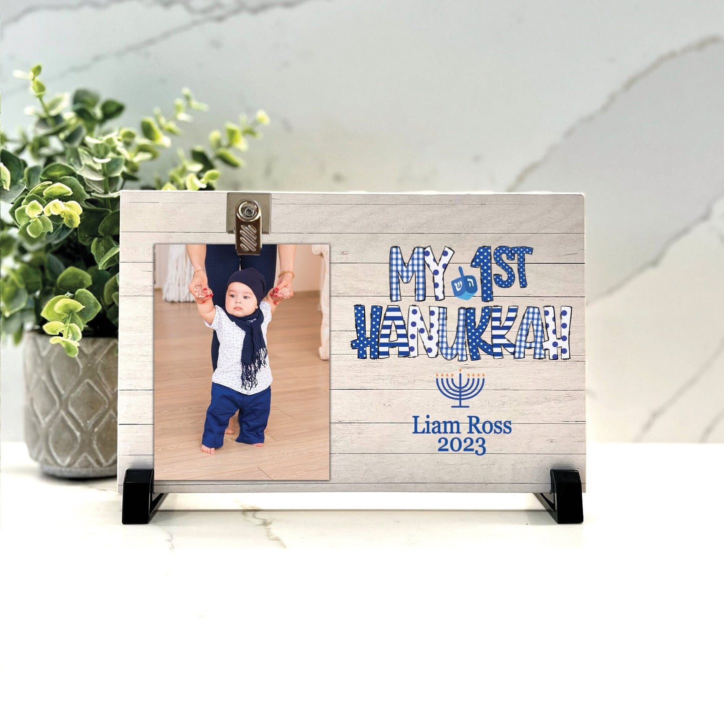 Customize your cherished moments with our First Hanukkah Personalized Picture Frame available at www.florida-funshine.com. Create a heartfelt gift for family and friends with free personalization, quick shipping in 1-2 business days, and quality crafted picture frames, portraits, and plaques made in the USA."