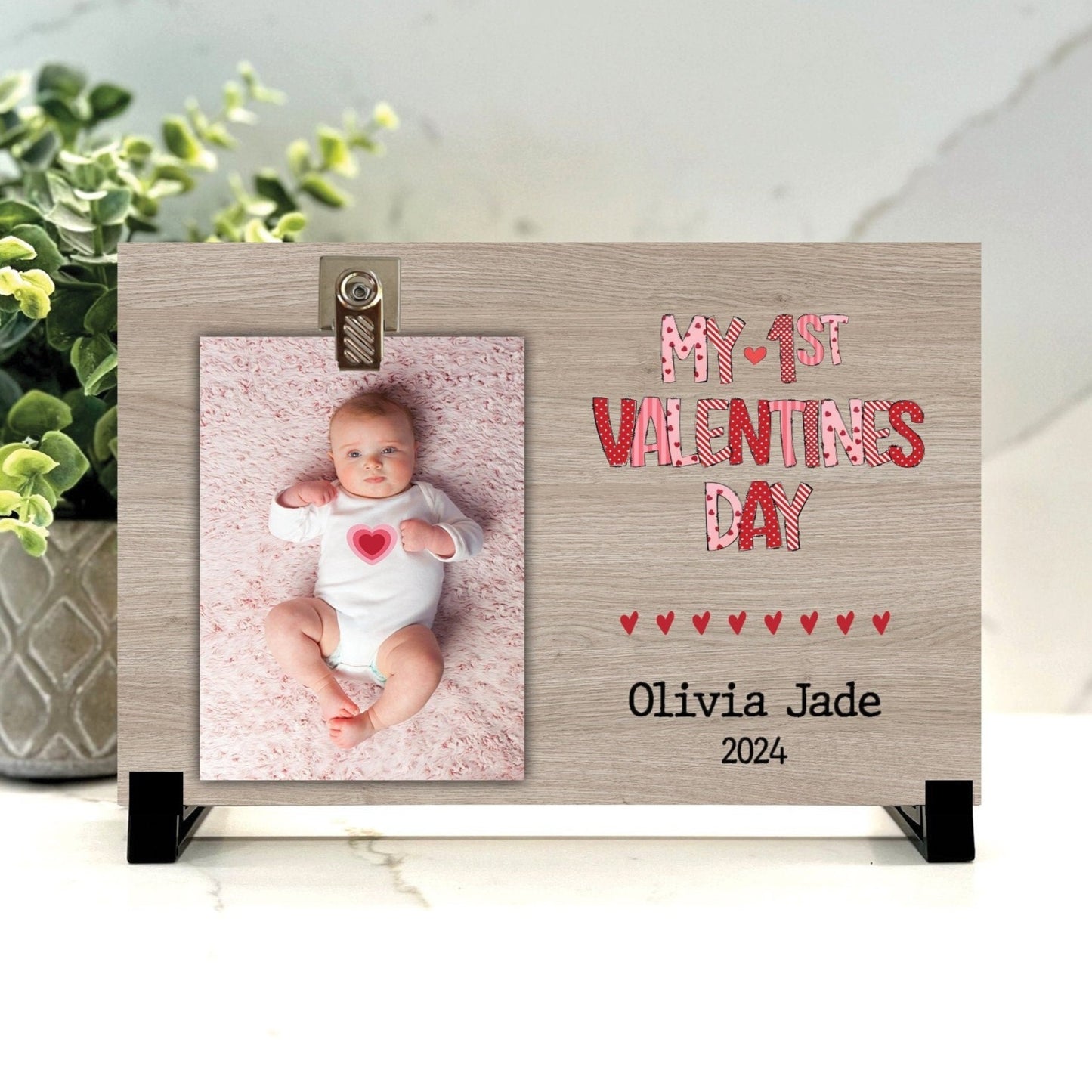 Customize your cherished moments with our First Valentines Personalized Picture Frame available at www.florida-funshine.com. Create a heartfelt gift for family and friends with free personalization, quick shipping in 1-2 business days, and quality crafted picture frames, portraits, and plaques made in the USA."